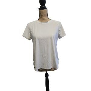 Lululemon white tulip layered back top with detailing at the bottom, size 6